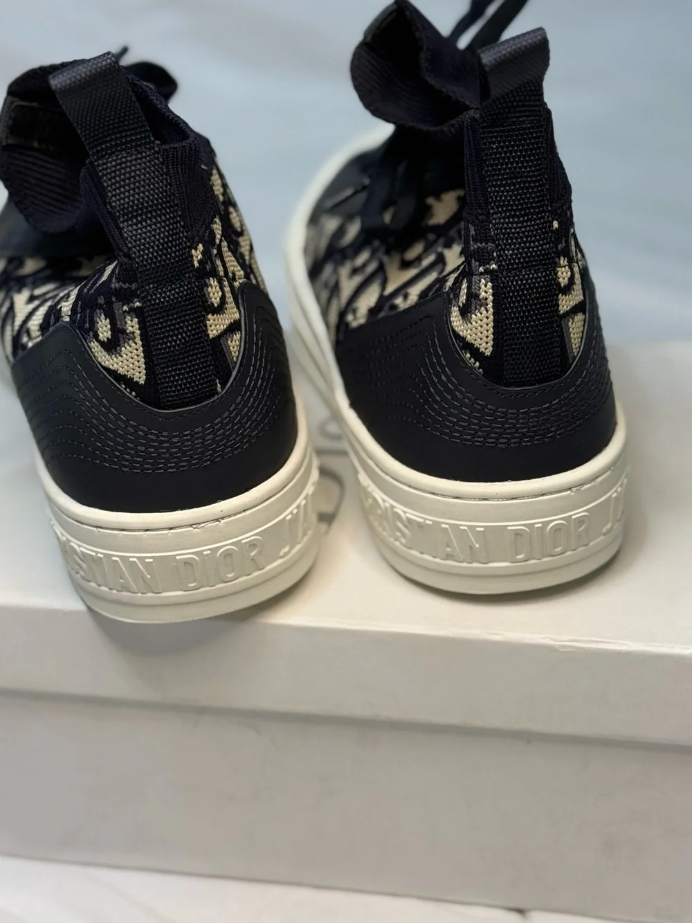 Dior Mid-Top Sneaker in Navy & Cream